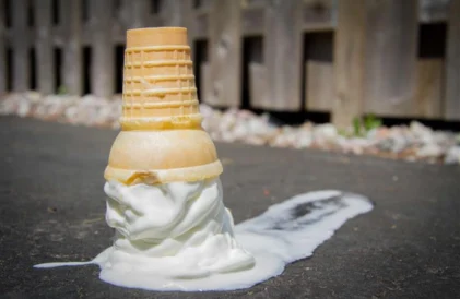 Melting ice cream cone that depicts summer, melt Dash students appearing to be ready for college, but never attend